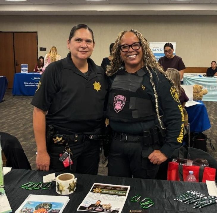 Parole Agents Diana Gonzalez, left, and Valarie Griffis of the San Diego Parole District representing DAPO and talking with students at the San Diego State University Criminal Justice Career Fair on Nov. 13, 2025.
