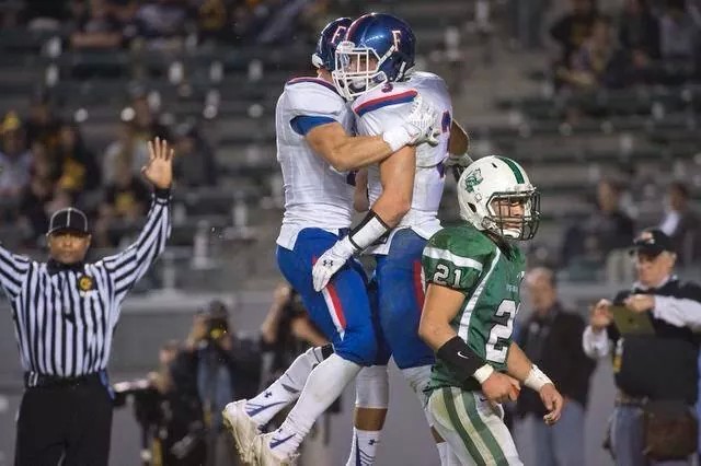 Jones refereeing high school football game