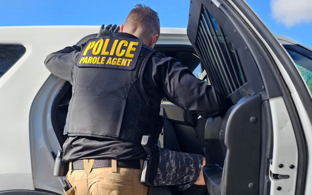 Operation Shasta Shield with a parole agent and a parole supervise person about to be transported to jail, Nov. 14, 2025.
