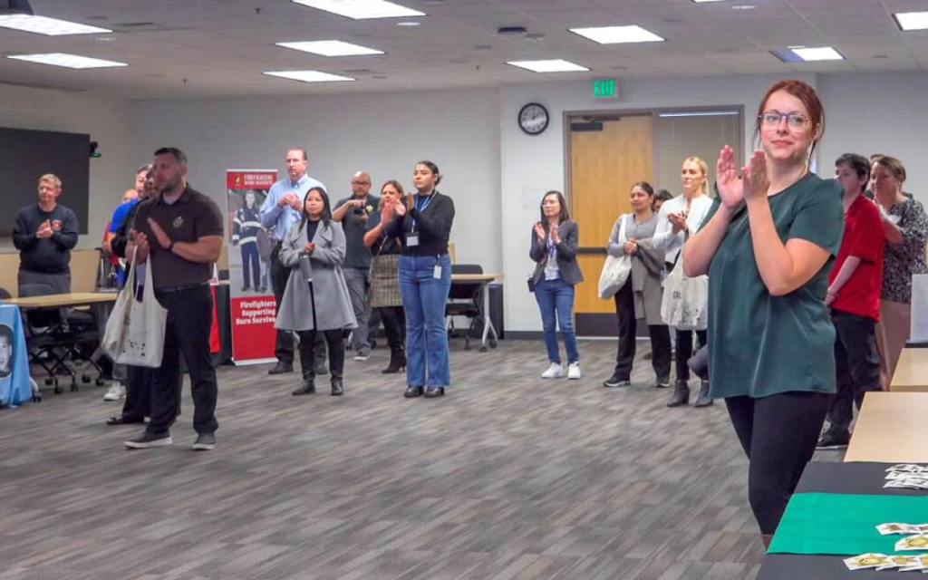 Staff attend the kick-off in Elk Grove for the Our Promise charitable giving campaign.