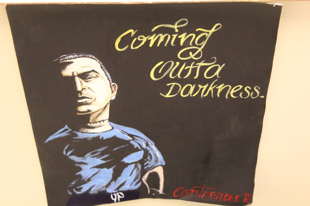 Art by an incarcerated artist titled Coming out of Darkness