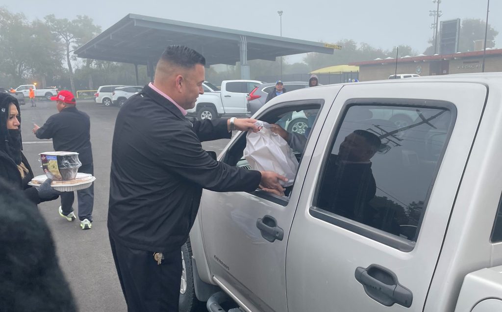 SATF Warden distributes Thanksgiving meals at Operation Gobble.