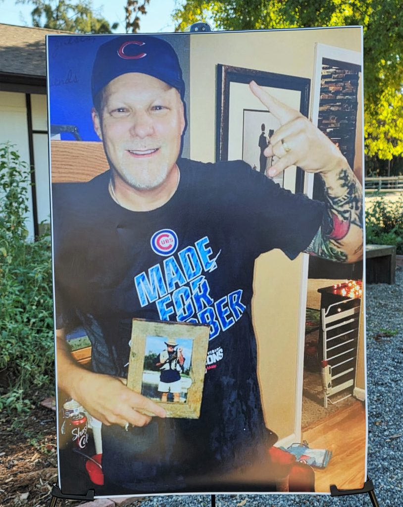 Photograph of adult Stephen Tennell displayed at the park for his service.