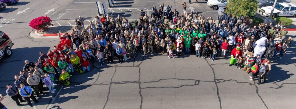 Group photo of Shop with a Cop event including prison staff and other law enforcement agencies.
