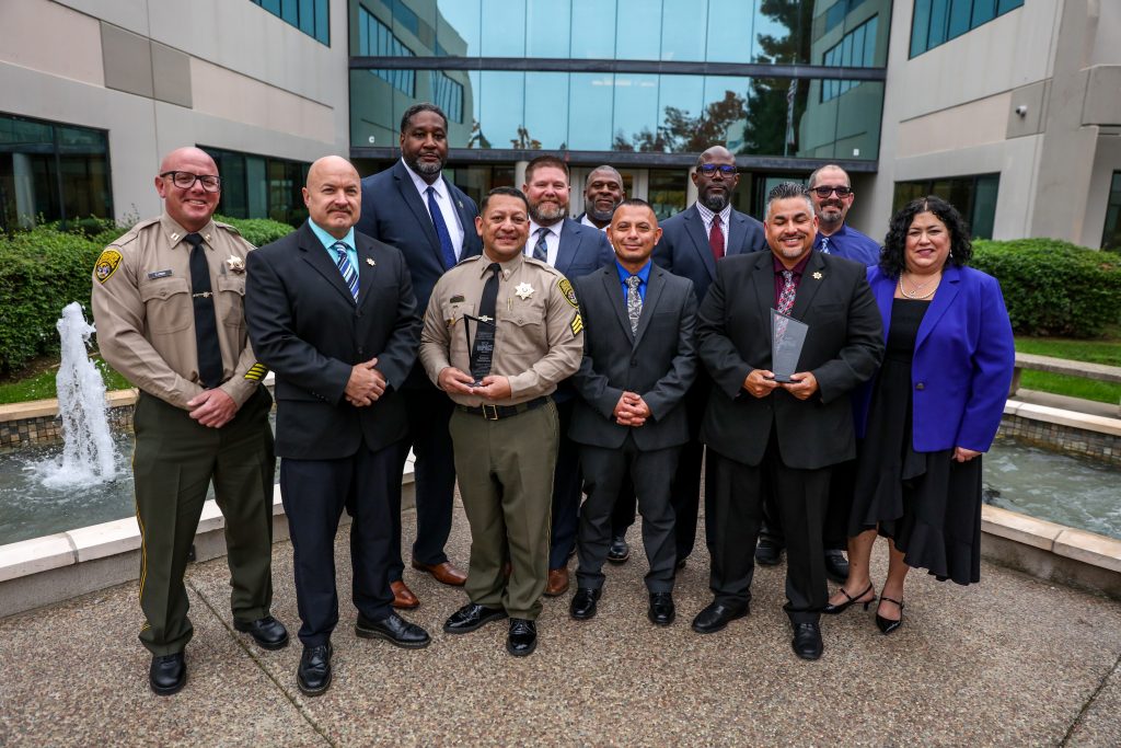 Impact Award honorees with CPOST commissioners and dignitaries.