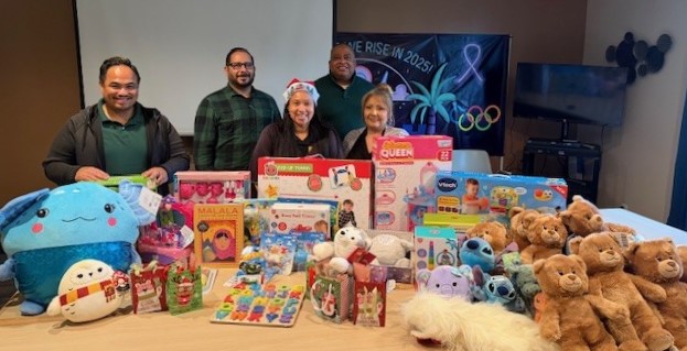 Parole staff with gifts for children.
