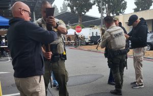 parole agents assist sheriff's office deputies in a gun safety buyback program in San Diego.