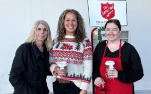 Staff at High Desert State Prison ring bells for Salvation Army during Battle of the Badges.