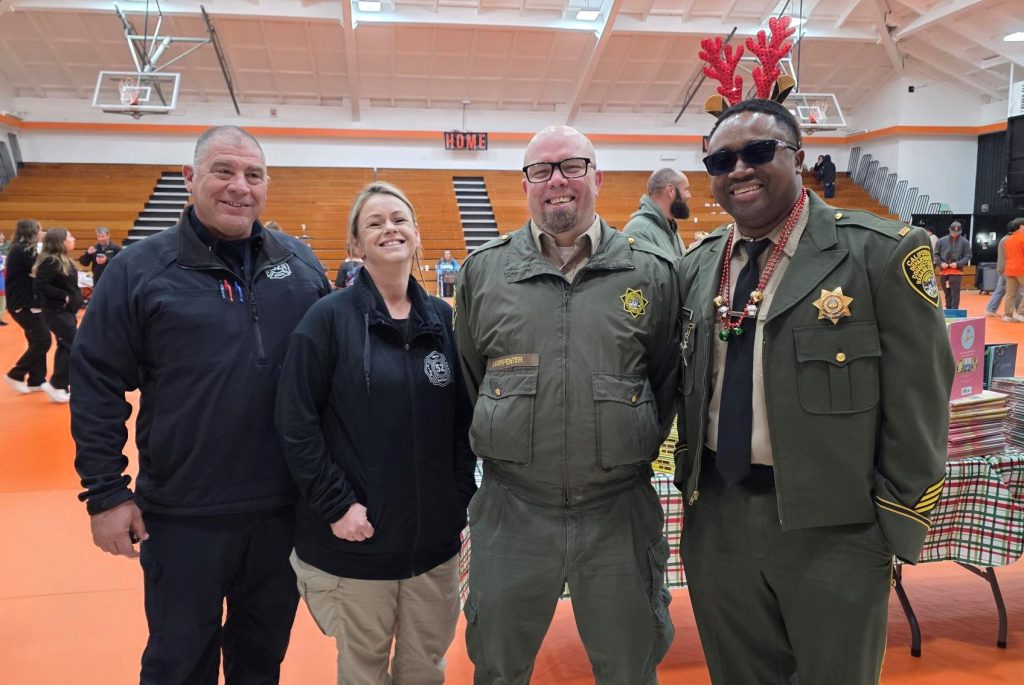Staff from High Desert State Prison at Holiday with a Hero in Susanville. 