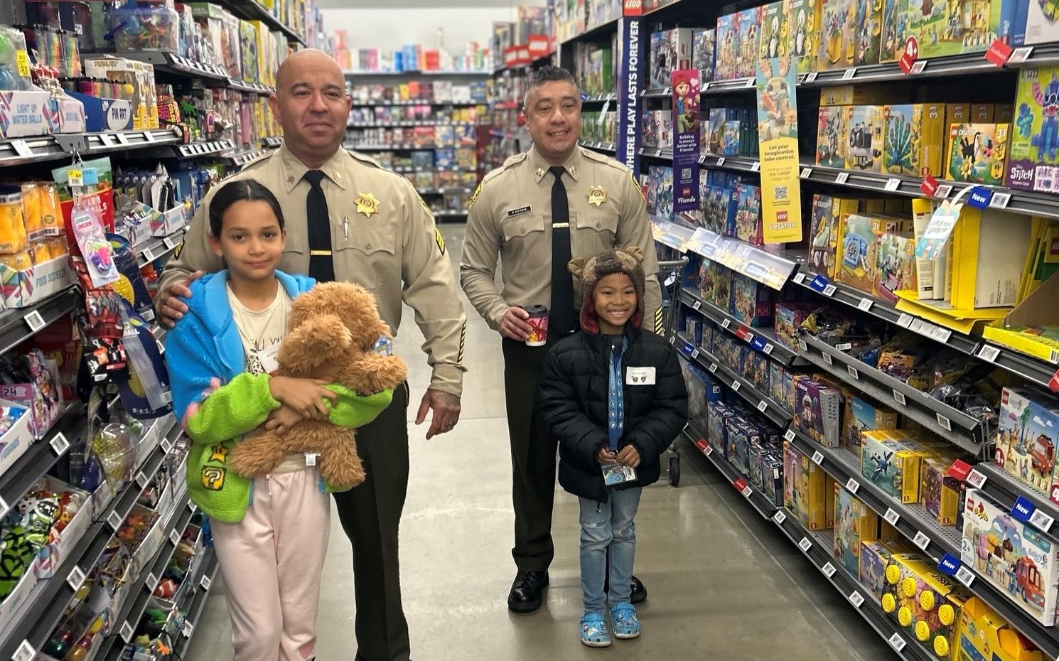 Shop with a Cop, NKSP and KVSP staff with children at Walmart.