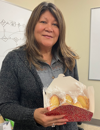 Female staff contestant at the CSP-Los Angeles County holiday bake-off.