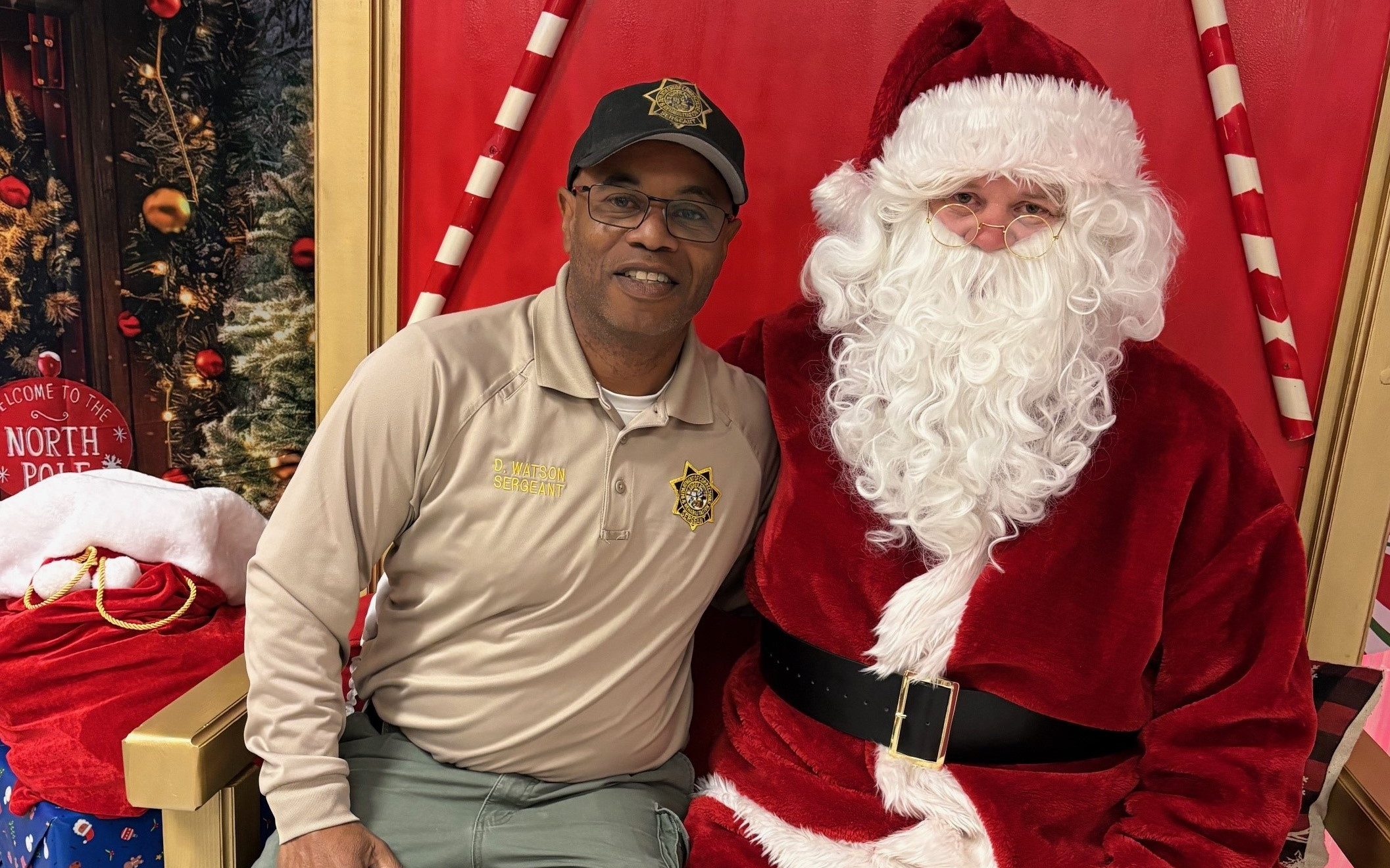 Custody staff member with Santa at CSP-Los Angeles County.