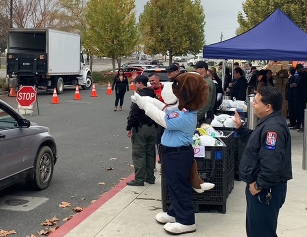 Hall ambulance was on hand to show their support for the holiday food distribution efforts of the Delano Police Department and North Kern State Prison, Nov. 25, 2025, Delano, Calif.