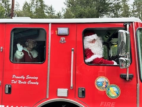 Santa, from Pelican Bay State Prison, CDCR, arrives on a fire engine.