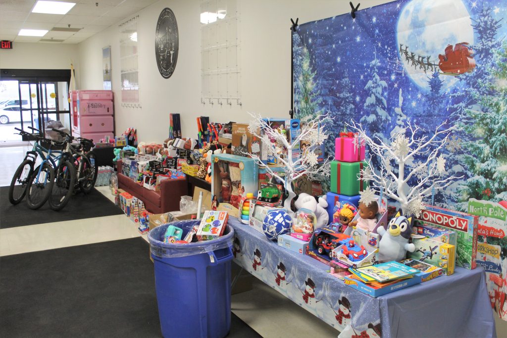 Pleasant Valley State Prison toy drive showing the lobby full of donated gifts.