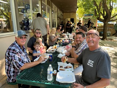 At SCC, staff enjoy a meal together.