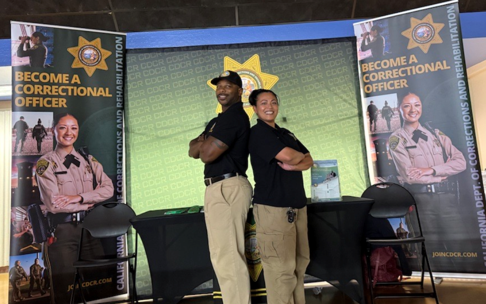 CDCR Recruiters posing back-to-back at SJSU