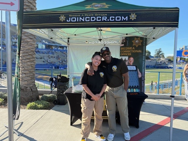 PORU recruiters embracing and smiling