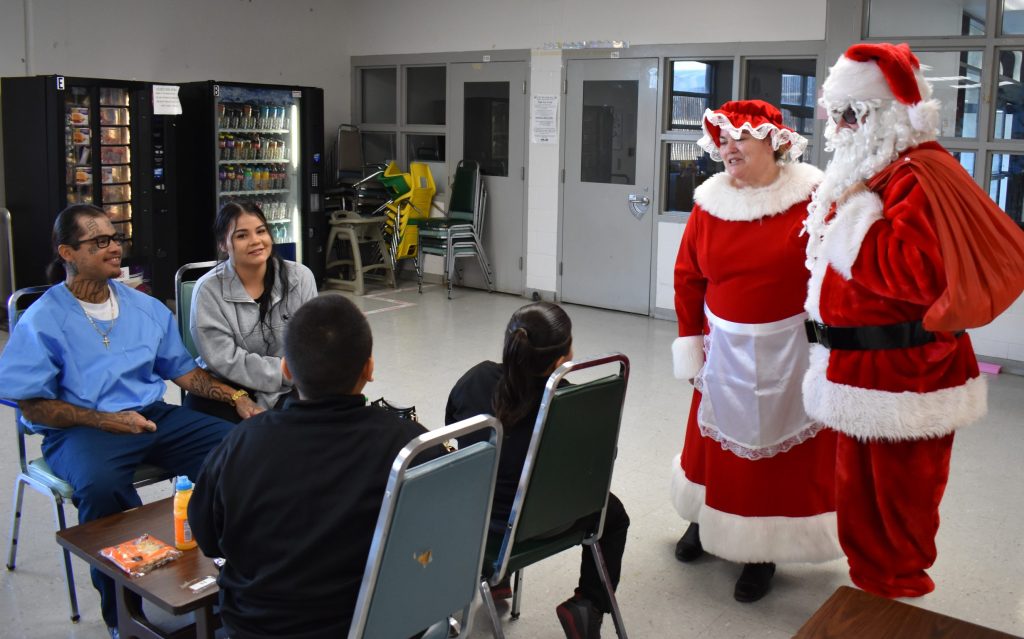 Santa and Mrs. Claus greet visitors at Salinas Valley State Prison.