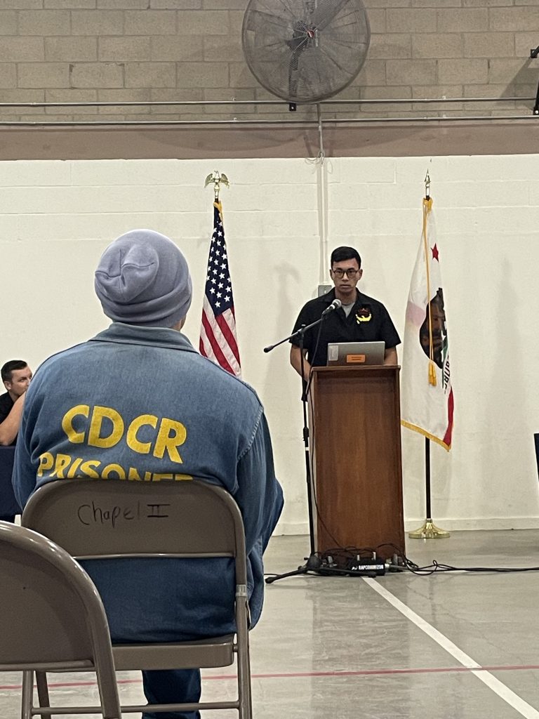 debate student at the podium