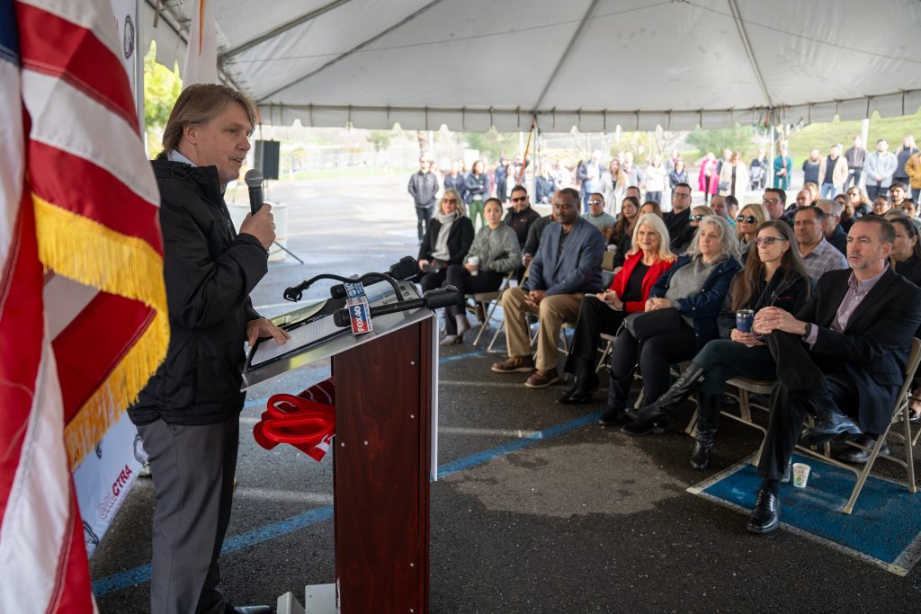 Retired General Manager Bill Davidson speaks during the ceremony for CALCTRA.