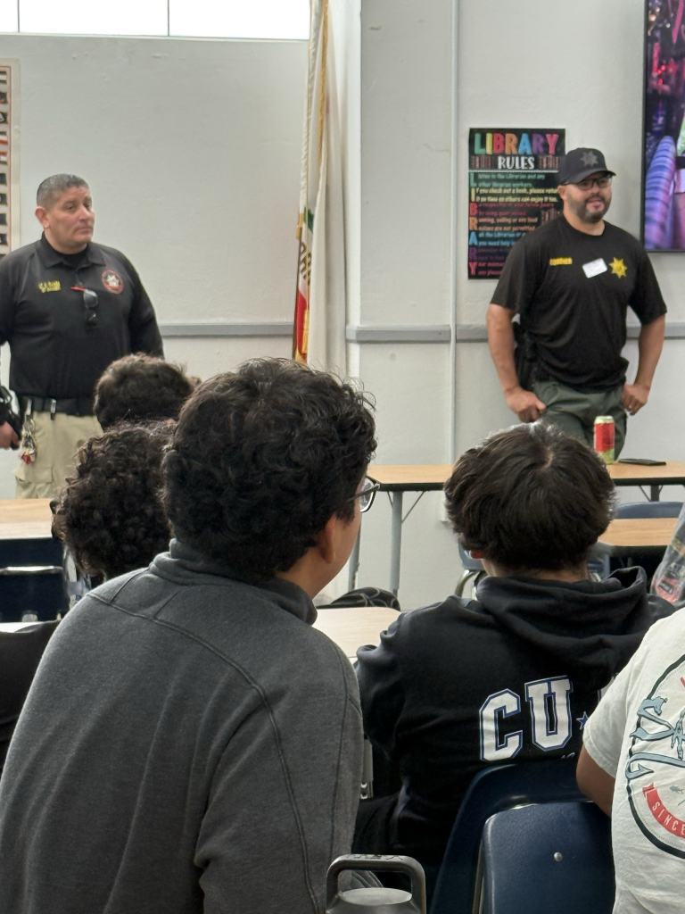 Lt Ramos speaking to students