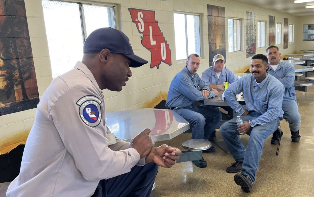 Jay Johnson, a VTC participant, speaks with the CMC fire department.
