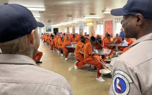 Ventura Training Center, or VTC, participants speak to Camp Cuesta crews at California Men's Colony in San Luis Obispo.
