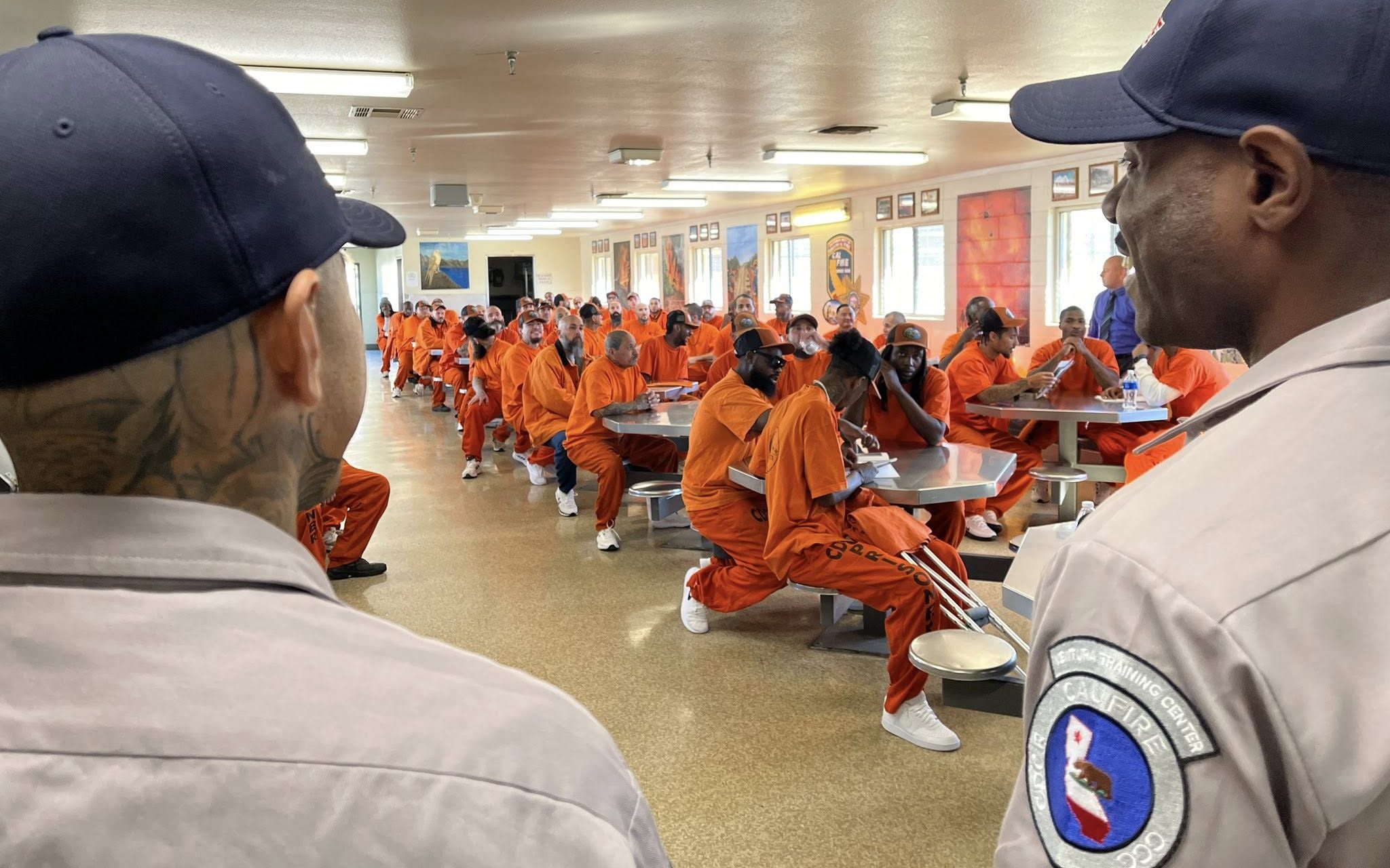Ventura Training Center, or VTC, participants speak to Camp Cuesta crews at California Men's Colony in San Luis Obispo.