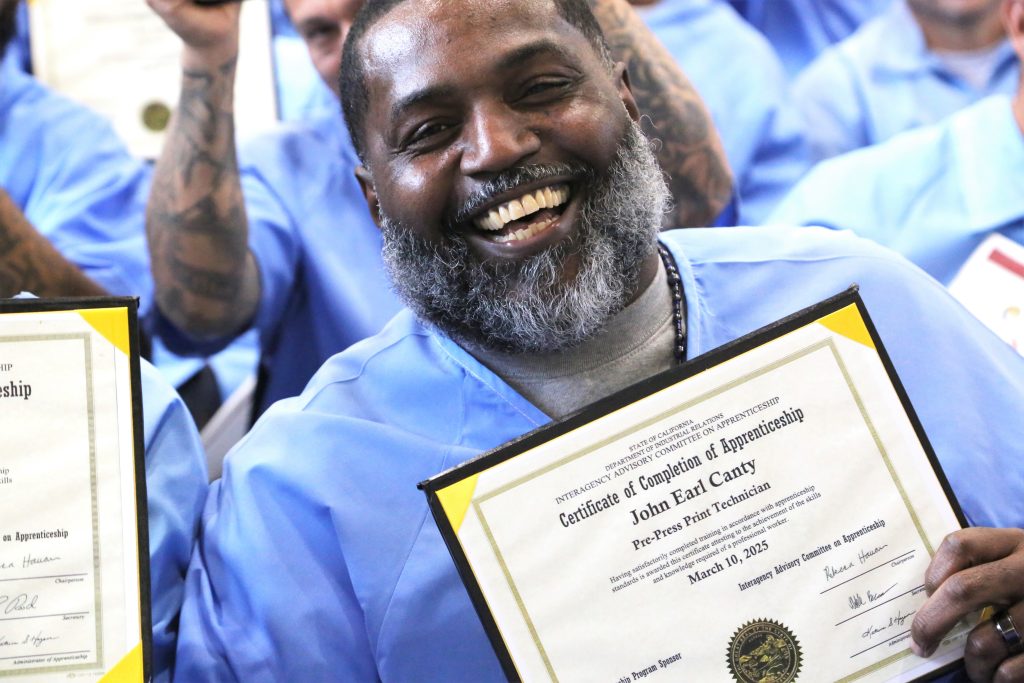 Graduate is all smiles at FSP.