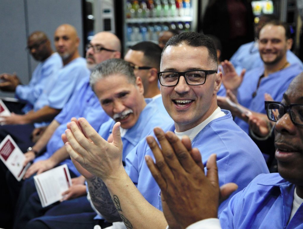 Graduates applaud the guest speakers at CALCTRA at Folsom.