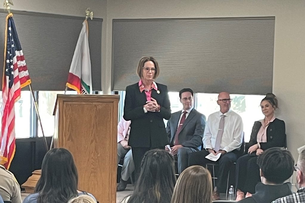 Director Gena Jones, Division of Adult Institutions, speaks during the promotional ceremony at High Desert State Prison in Susanville.