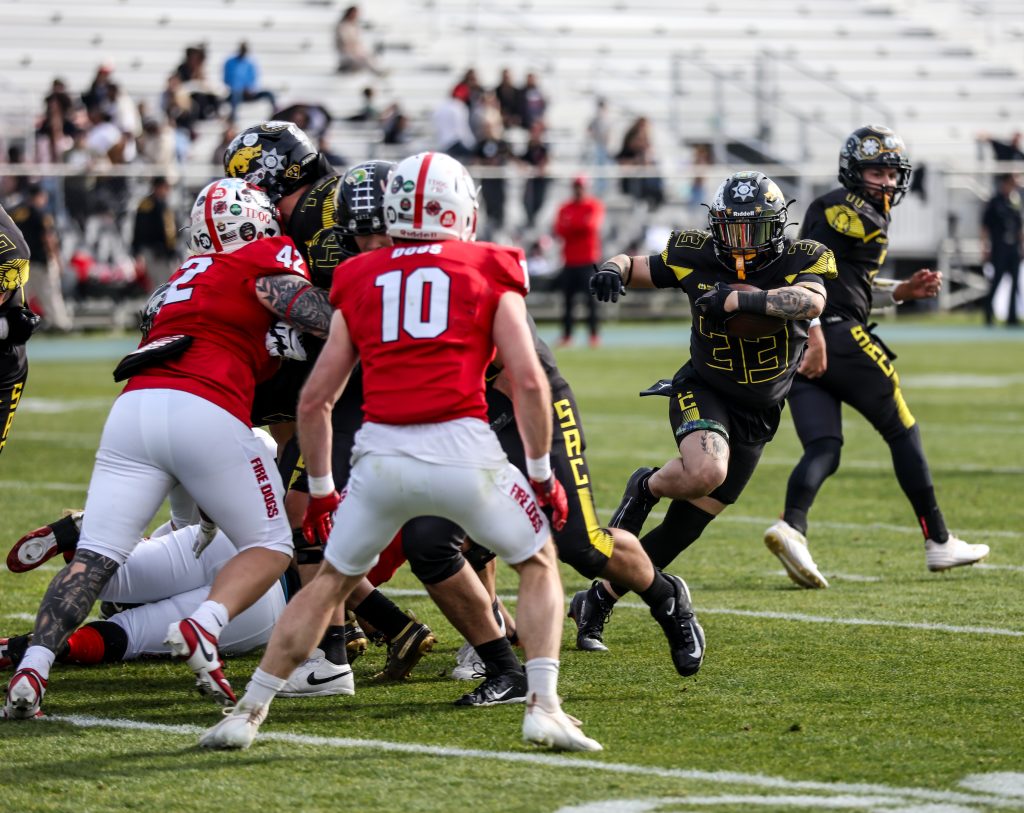 Players struggle for the ball during Guns and Hoses 2026.