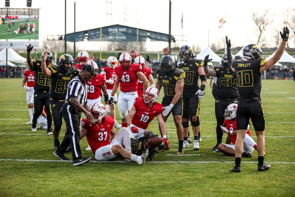 Players on the field during Pig Bowl Guns and Hoses 2026.