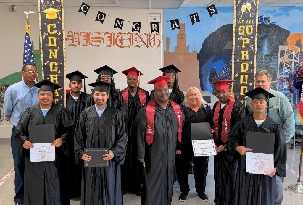 Group photo of incarcerated students with prison staff at Salinas Valley State Prison, Soledad, California, February 2026.