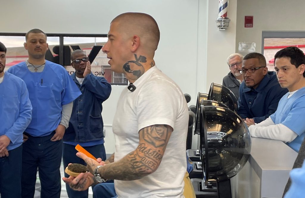 Vic Blends speaks with the incarcerated barbering students at Valley State Prison, Chowchilla, California, February 2026.