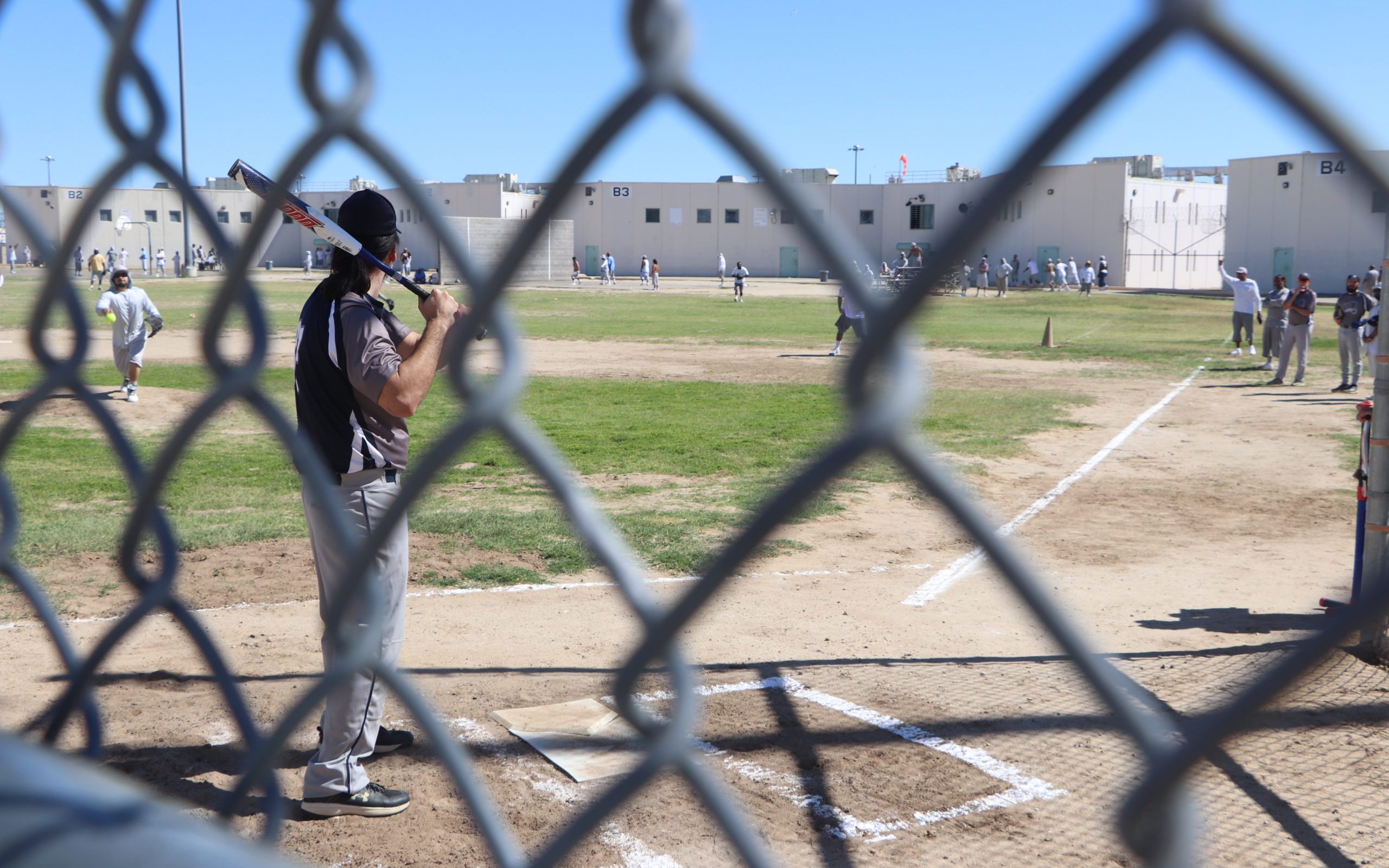 A softball game at Centinela State Prison with Saints Prison Ministry as a rehabilitation effort in California.