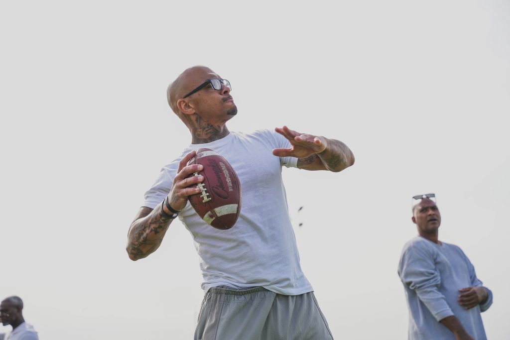 A player readies to throw the football at CIM.