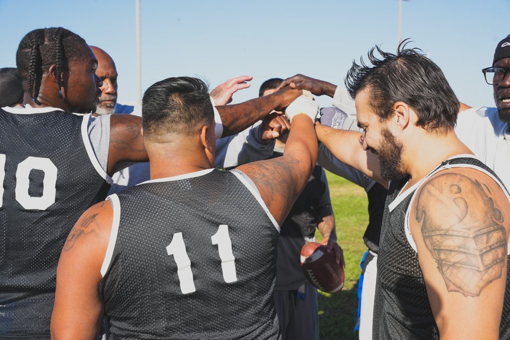 Players huddle together to promote teamwork at CIM.