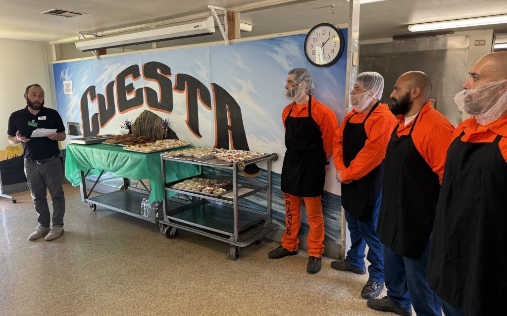 Incarcerated students graduate the culinary program at CMC.