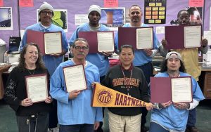 Correctional Training Facility at Soledad, California, Rising Scholars program group photo with Hartnell College.