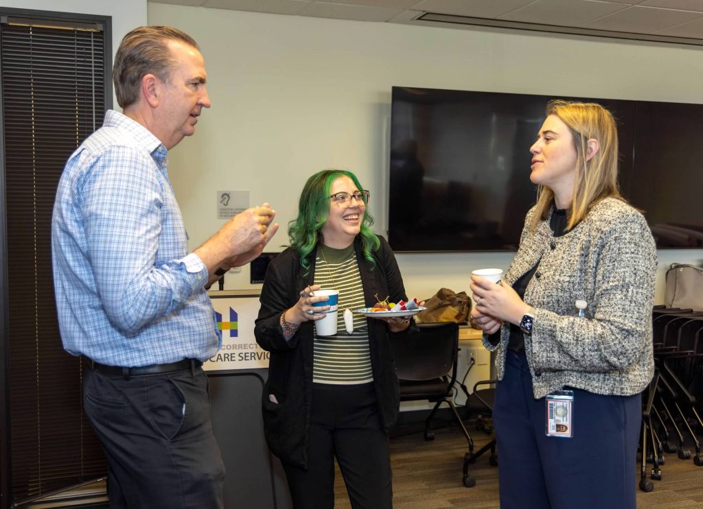 CDCR Secretary Jeff Macomber and staff talk during Coffee and Connect event