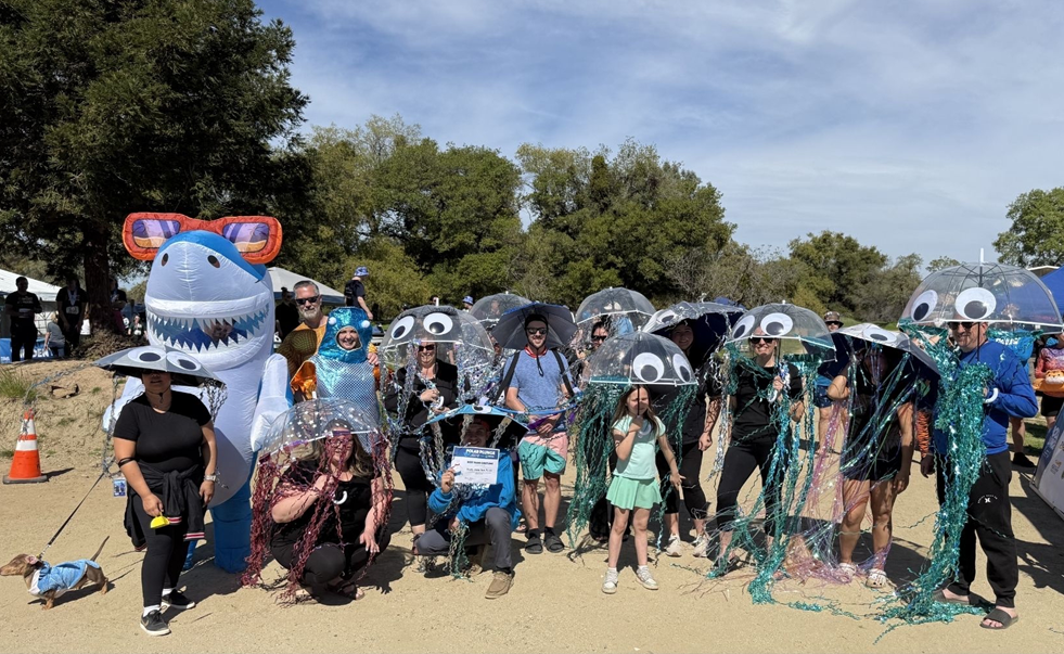 Mule Creek State Prison staff volunteers jump into the lake at Granite Bay.