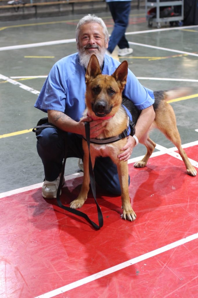 Incarcerated person with dog