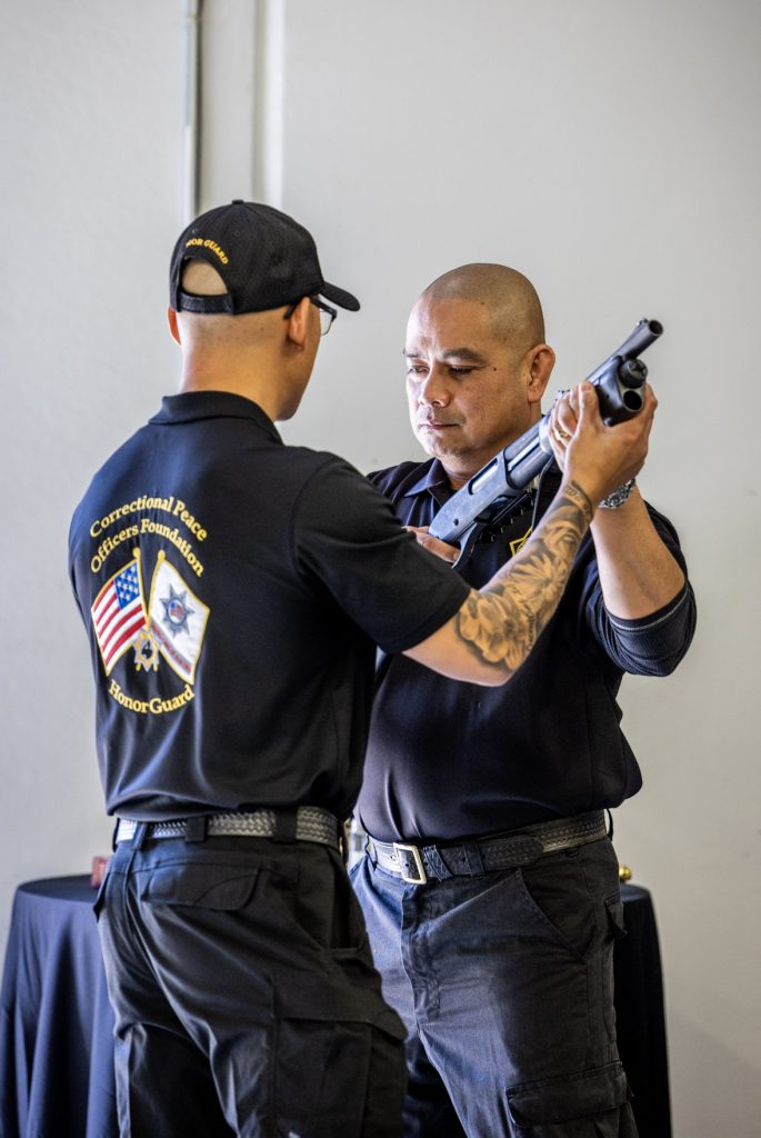 Training on how to hold the gun for the 21-gun volley as part of their Honor Guard duties.
