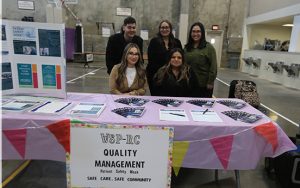WSP-RC health and wellness fair for the incarcerated population with staff at a booth.