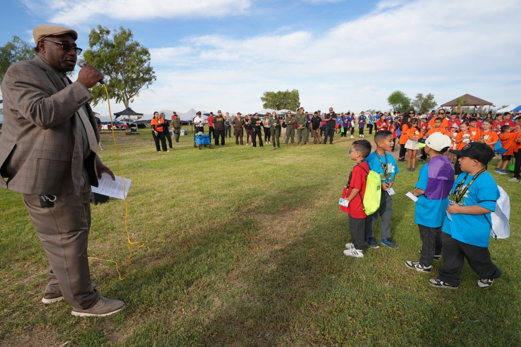Centinela Warden Greene and the kids attending the Junior Academy.