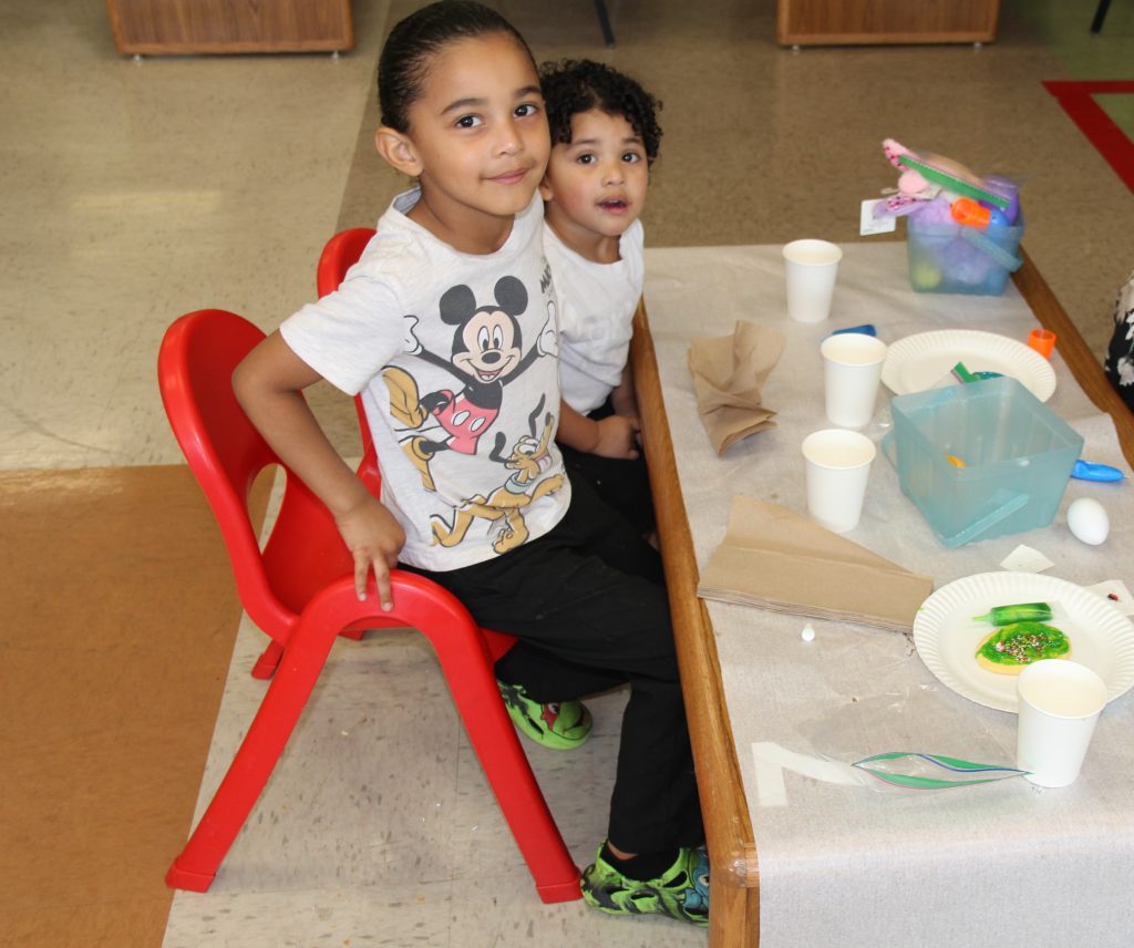 Children decorate eggs at CHCF in Stockton.