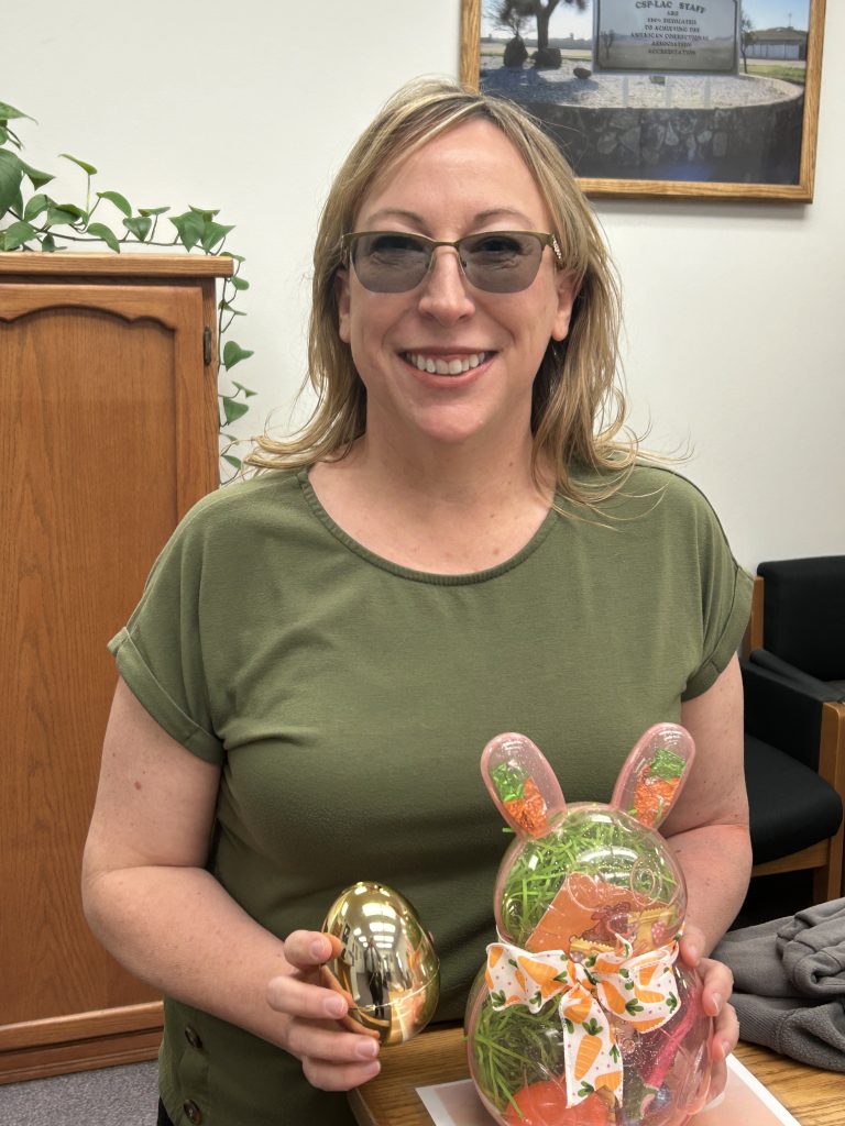 Golden egg, prize and staff member at CSP-Los Angeles County in Lancaster, California.