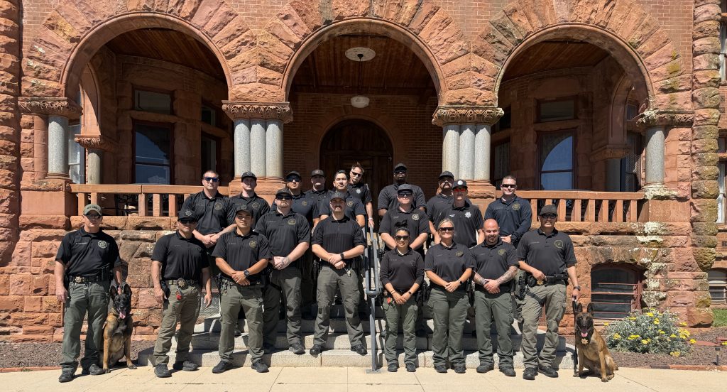The Investigative Services Unit at Mule Creek State Prison stands in front of the historic Preston Castle, a former youth facility in Ione.